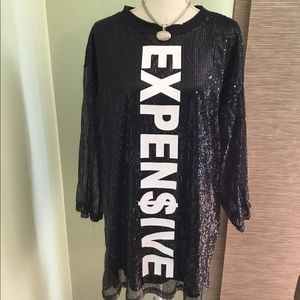 Turn heads in this Never Worn Statement Dress